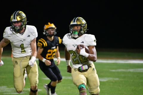 Wade Cheek/The Clayton Tribune. RGNS senior Tyrell Campbell (22) rushed for four touchdowns as the Eagles moved to 2-0 on the season with a 39-6 win. 