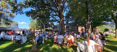 Megan Horn/The Clayton Tribune. Over 200 people were fed at The Dillard House Sunday, Sept. 3 for a Labor Day cookout on the Rock House Oaklawn. Attendees enjoyed live entertainment by Hunter Grayson and many different types of food. 