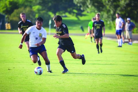 RGNS Athletics. RGNS sophomore Gabriel Ruelas races to the penalty area against TC Robertson on Aug. 22.