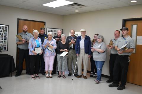 Megan Horn/The Clayton Tribune. Pictured ar e Logan Carnes with Rabun County EMS; Beverly Mason; Justin Upchurch, assistant chief Rabun County Fire Services; Marilyn Ballew; Mike Carnes, EMS/911 director; Jane Thomason; Gregg Dover, CAD/911 network manager; Daniel “Jack” Smith; Katie Coalley with Rabun 911; Kenette Turner with Rabun 911; Jonathan Watts with Rabun EMS/fire; and Tate Nichols with Rabun EMS. 