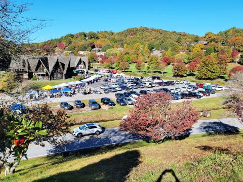 Enoch Autry/The Clayton Tribune. With the backdrop of autumn colors, hundreds of vehicles brought visitors the city. Below: Third place in the Hay Bale Trail competition went to Bartram Trail Conservancy for their hay bale shaped like a shoe with animals that promoted hiking the trail and staying active.