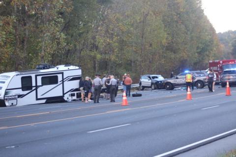 Thomas Sherrill/The Franklin Press. Emergency personnel from North Carolina work the scene of a four-vehicle crash with one fatality and other injuries on Georgia Road in Otto, N.C., Friday, Oct. 20. The scene left extensive damage on the roadway. The North Carolina State Highway Patrol is investigating the crash that caused traffic to back up as the road was closed for over four hours. 