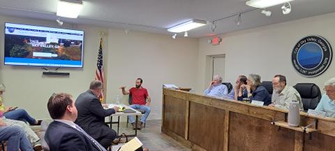 Megan Horn/The Clayton Tribune. Officer Casey Brown was reinstated as a Sky Valley Police Officer after a special called personnel hearing with Sky Valley Council members Oct. 30. Pictured is Brown speaking under oath about his time as an officer. 