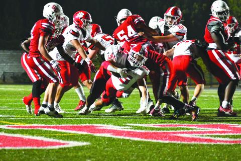 Wade Cheek/The Clayton Tribune. Rabun County sophomore running back Reid Giles extends for the end zone in the Wildcats state playoffs first round win over Social Circle. RCHS will play at Whitefield Academy in the Sweet 16 Friday.
