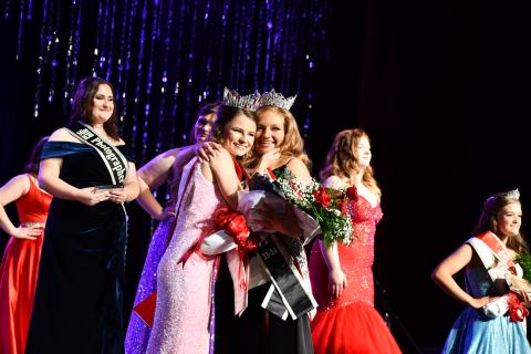 Megan Horn/The Clayton Tribune. Ashlynn York Blackwell is crowned 2023-2024 Miss RCHS at the Oct. 28 Scholarship Pageant. Miss RCHS 2022-2023 Rainny Marie Ramey presents Blackwell with her crown, sash and flowers. 