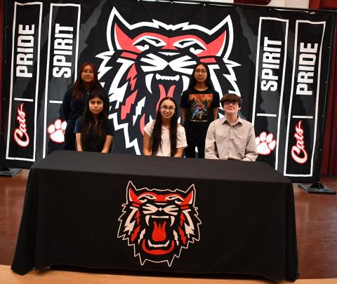 Megan Horn/The Clayton Tribune. During a special signing ceremony Nov. 16, five students at Rabun County Schools committed to a REACH Georgia Scholarship program for the opportunity to obtain $10,000 in college scholarships. Pictured are 2023-2024 REACH Scholars Maeli Chastain, Melina Hernandez, Naomi Lopez Ramirez, Saray Rodriquez and Caden Watts. 