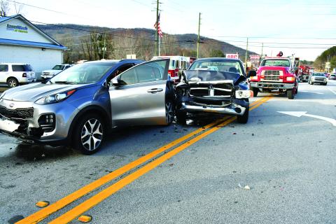 Megan Horn/The Clayton Tribune. Two of the vehicles involved in a five-vehicle crash on Dec. 21 remained in the middle of Highway 441 on Dec. 21 as first responders worked the scene. Minor injuries were reported and a Rabun County man was arrested following the crash. 