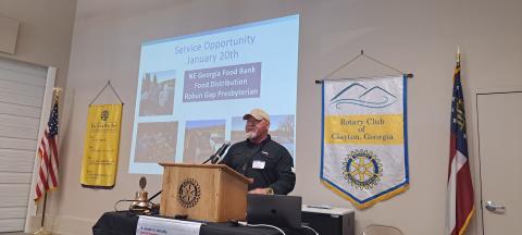 Megan Horn/The Clayton Tribune. Lt. Mark Gerrells of the Rabun County Sheriff’s Office talks to Clayton Rotary members about how to avoid holiday scams.