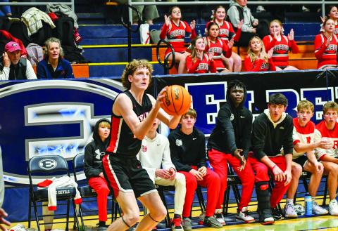 Wade Cheek/The Clayton Tribune. Wildcat Hayes Free lines up his shot against Elbert County.