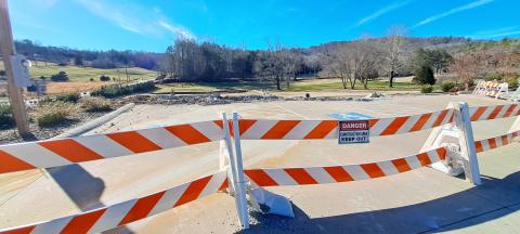 Megan Horn/The Clayton Tribune. Rabun County commissioners approved a $1.4 million bid from Tom Adams Construction to rebuild the golf pro shop building. With commissioners hopeful work will start at the end of January, the project will take about 10 months to complete. It will be the third building on the same spot.