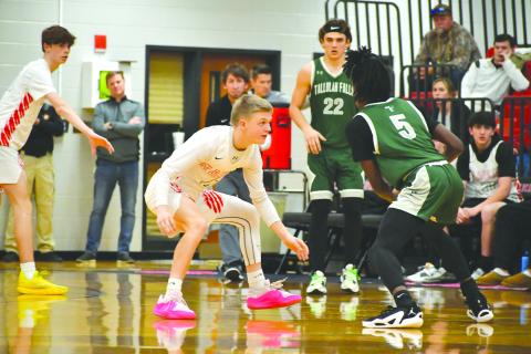 Wade Cheek/The Clayton Tribune. RCHS hoops freshman Landan Bedingfield guards the perimeter during a Feb. 9 matchup between the Wildcats and the Tallulah Falls School Indians. The 72-57 victory gave RCHS a top-spot in the region, tied with Athens Christian. 