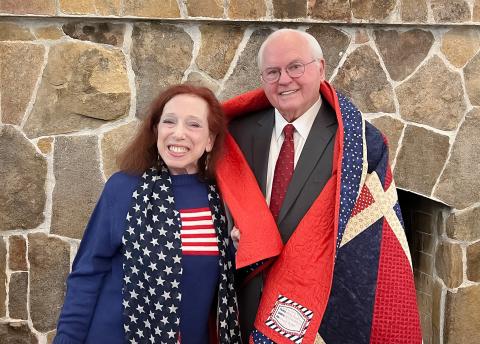 Photo courtesy of Tallulah Falls School. At the Tallulah Falls School January Board of Trustees meeting, board member Alice Cookie Noel, a member of the Quilts of Valor committee for South Central Georgia and for the Lake Oconee Quilt Guild, presented President and Head of School Dr. Larry A. Peevy with a quilt created by Kathy Henderson, a member of the Lake Oconee Quilt Guild.