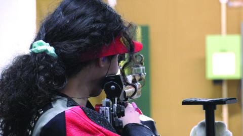 TFS Athletics. TFS marksman and Junior Olympic Qualifier Brianna Walter lines up a shot during the GHSA semifinals against Kendrick on Feb. 29. 
