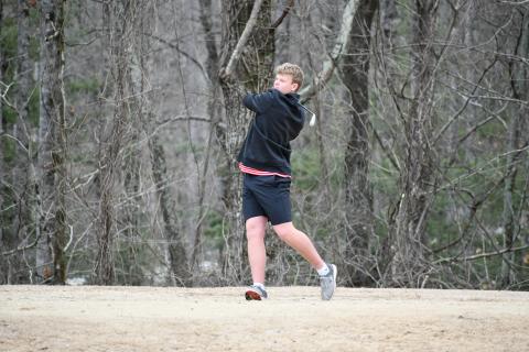 Wade Cheek/The Clayton Tribune. RCHS senior Jack Hood drives off the tee at Kingwood Resort during the Wildcat golf team's match against Dawson County on Feb. 29. Hood shot a 38 to help RCHS win 176-186.