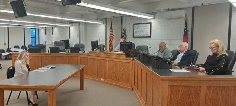 Megan Horn/The Clayton Tribune. Council member Amanda Harrold (far left) speaks to Clayton City Ethics Committee members Broderick Crawford, Carl Butler and Libby Jones Farley; and City Attorney Mitch Baker during Tuesday’s public hearing. 