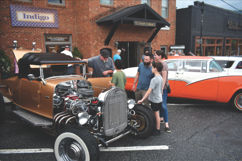 File photo/Enoch Autry/The Clayton Tribune. The August 2023 Clayton Downtown Block Party drew hundreds to Main Street to see classic cars, eat good food and have fun. On Saturday, March 16, another block party also will have a lot to offer.