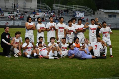 Wade Cheek/The Clayton Tribune. The RCHSsoccer team strikes a pose to celebrate their first round postseason win over Oglethorpe County; the Wildcats were later eliminated by Atlanta power Atlanta International on Wednesday, April 24. 