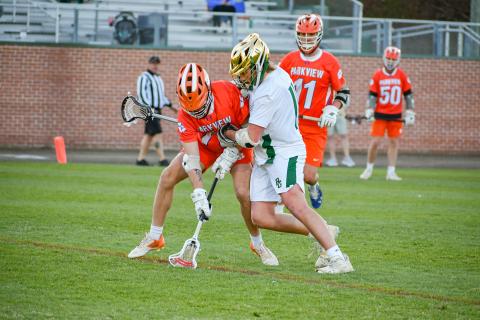Wade Cheek/The Clayton Tribune. RGNS senior Jack Moores applies defensive pressure on Parkview High School during a March 28 game against the Panthers. The Eagles shut the Panthers out 16-0 to move to 7-1 on the season.