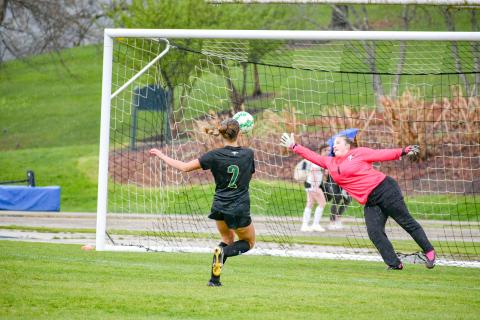 Wade Cheek/The Clayton Tribune. RGNS senior forward Georgia Mattis watches her first of three goals pierce the net during a cross-county match against Tallulah Falls School on Tuesday, April 9. Rabun Gap improved to 10-2.
