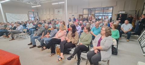 Megan Horn/The Clayton Tribune. It was standing room only in the Food Bank of Northeast Georgia Community Room April 11 as over 100 people attended a question and answer forum for Board of Commissioner and Clerk of Court candidates, co-hosted by Rabun County Republicans and The Clayton Tribune with Publisher Enoch Aury moderating.