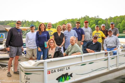 Photo credit to Melissa Elzey. The Clayton Rotary Volunteers smile for the camera as they help with LBCA Clean Up Day.