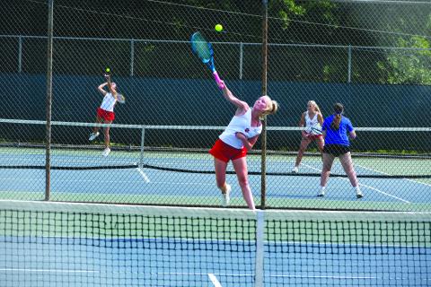 Wade Cheek/The Clayton Tribune. Lady Cat senior Abby Sego stretches to reach a serve during Rabun County’s Final-Four match against Atlanta International on Thursday, May 2. The Lady Cats fell 3-0 but made an impressive run to the semifinal after defeating three respective opponents. 