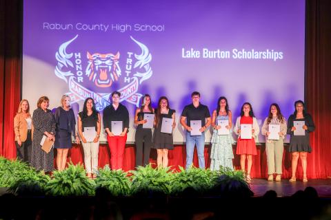 Photo courtesy Melissa Elzey. LBCA Foundation Scholarship Chair Diane White (from left), Scholarship Committee Member Frankie Singer, and LBCA President Elizabeth Gill stand with LBCAF scholarship award recipients at the Rabun County High School program.