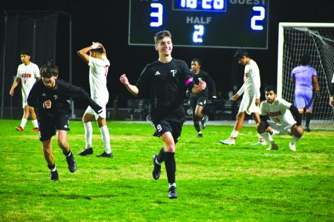 Wade Cheek/The Clayton Tribune. Austin Ball, a first-team all-state member, celebrates after scoring a goal in the 2023-2024 season.