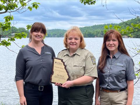 Submitted. Pictured are Michelle Egan, with the DNR Region, Amy Speed, administrative assistant at Moccasin Creek State Park, and Angie Johnson, Georgia State Parks Director. Speed recently won a statewide Customer Service Award from the Georgia Department of Natural Resources (DNR).