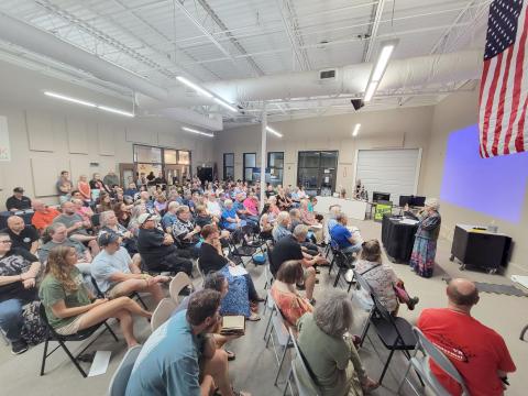 Enoch Autry/The Clayton Tribune. A total of 225 paid for Rabun County’s first-ever World UFO Conference that was held at the Food Bank of Northeast Georgia on June 29. Below: Those in attendance even donned springy antenna to salute the visitors from afar.