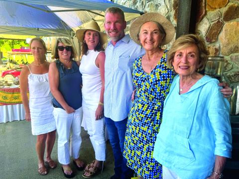 Submitted photo. Diane White (from left), Patricia Jones, Christy and Charles Martin, Lin Goen, and Elizabeth Darby are all smiles after an afternoon spent with award-winning New York Times bestselling author Charles Martin.