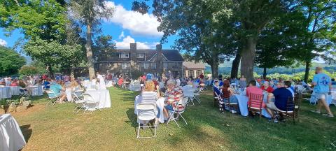 Megan Horn/The Clayton Tribune. Hundreds of people enjoyed the festivities at The Dillard House, which is the last Fourth of July hosted by the Dillard family. Below: Natalie Dillard took this picture of the biggest fireworks show yet at The Dillard House July 6. 