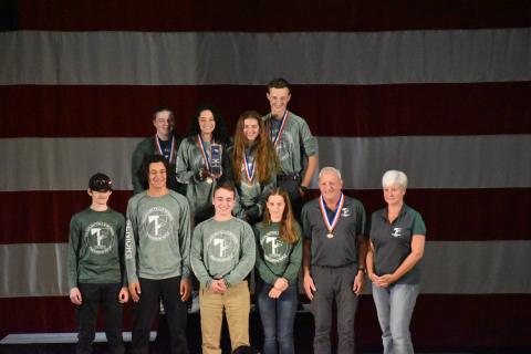 Wade Cheek/The Clayton Tribune. TFS marksmen stand with their medals after winning a national championship at this year’s CMP 3P Precision Air Rifle National Championship at Camp Perry in Ohio. 