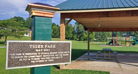 Megan Horn/The Clayton Tribune. Because of his commitment to the Town of Tiger, Tiger Park was dedicated to Jackie Watts in May 2021 and a plaque is displayed at the park in his honor. 
