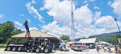 Megan Horn/The Clayton Tribune. Many community heroes supported the Habitat for Humanity of Rabun County Touch-A-Truck event in Clayton last weekend and kids got the opportunity to explore various vehicles such as fire trucks, tow trucks, and many others. Below: James Reddy, 4, and Jones Reddy, 2, enjoy their time climbing into the driver’s seat of this 1960 Fiat Multipla presented by Capital City Home Loans at the Habitat for Humanity Touch-A-Truck event. 
