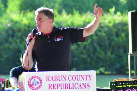 Enoch Autry/The Clayton Tribune. U.S. Congressman Andrew Clyde talks to the crowd after the audience ate sausage, potatoes, corn on the cobb, and shrimp.