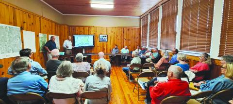 Megan Horn/The Clayton Tribune. The Dillard City Hall council meeting had a roomful attendance as citizens listened to David Marvin and Bryan Bullock discuss plans for the $52 million capital investment project, Dillard House Farm Resort. 
