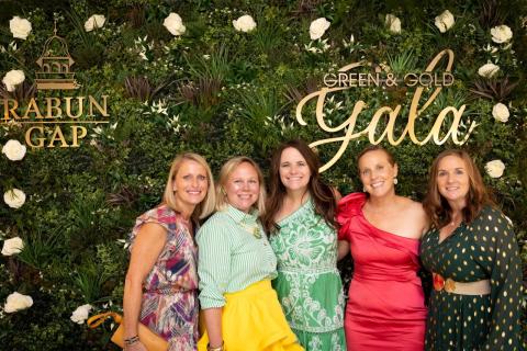 Submitted photo. Rabun Gap parents and volunteer gala committee members Meghann Brackett, Sarah Barge, Jennifer Stapleton, Bethany Weisser, Lisa Haynie at Rabun Gap-Nacoochee School’s Green & Gold Gala.