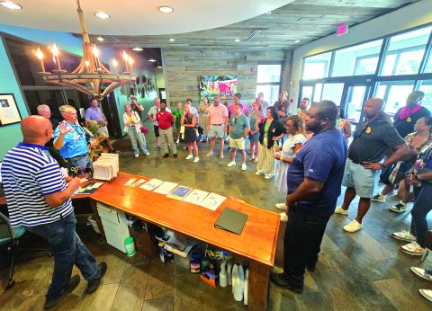 Enoch Autry/The Clayton Tribune.  James Brim gives members of the Leadership Georgia group information about the Food Bank of Northeast Georgia. Below: Submitted photo: The Tallulah Gorge State Park one of the many stops for the Leadership Georgia class who visited Rabun County last week.