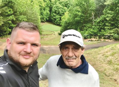 Submitted. Rabun County local Justin Ott stands with father Mel Ott after he sank a hole-in-one at Apple Mountain Resort and Golf Club last Sunday, Sept. 15. 