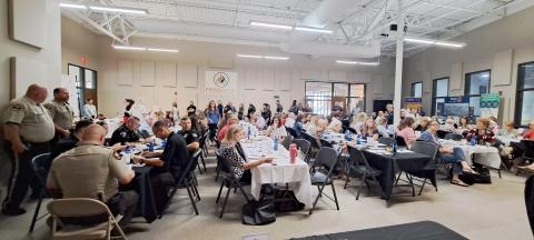 Megan Horn/The Clayton Tribune. Numerous leaders in the community including officials, law enforcement, church leaders, nonprofit representatives and many others in Rabun County and the region came together to learn more about how to prevent violence at the Stopping Violence Breakfast on Aug. 29. The Community Room at the Food Bank of Northeast Georgia was filled with attendees. 