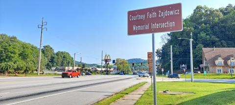 Megan Horn/The Clayton Tribune. Signage is displayed at the Walgreens intersection recognizing the area as “Courtney Faith Zajdowicz Memorial Intersection.” Another sign is displayed at George Eller Curve that reads, “In Memory Of Courtney Faith Zajdowicz DUI Victim September 1, 2021.” Below: Photo submitted.