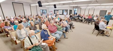 Megan Horn/The Clayton Tribune. It was a packed room at Clayton City Hall on Thursday, Oct. 10, as candidates for County Commission and Board of Education answer questions at forum.
