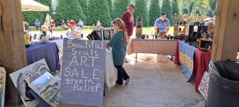 Megan Horn/The Clayton Tribune. Since the Foxfire Mountaineer Festival was held the weekend after Hurricane Helene, many crafters set up ways attendees could help storm victims during their time of need. Below: Submitted photo from the Foxfire Mountaineer Festival. 