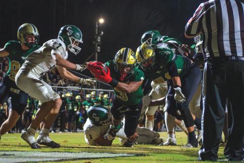 Wade Cheek/The Clayton Tribune. Rabun Gap senior running back Anthony Quinn Jr. stretches out for an Eagles’ rushing touchdown in their semifinal win over the Christ School, 42-7. In a title game rematch, Providence Day comes to RGNS Friday.