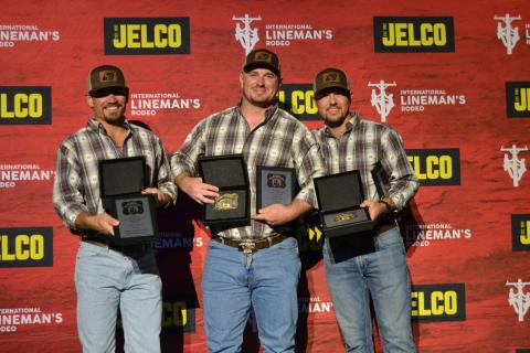 Submitted photo. HEMC linemen Dillon Welborn (left) Robert Morris, and Tucker Dyer stand with their awards.