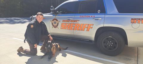 Megan Horn/The Clayton Tribune. K9 Doug retired from the RCSO on Oct. 1 at the age of 8. Pictured with Handler Sgt. Brandon Hyer, the pair worked as partners for seven years to seize pounds of narcotics.