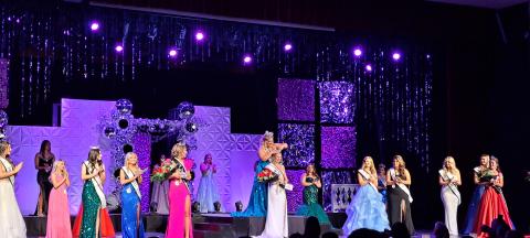 Megan Horn/The Clayton Tribune. Sayler Michelle Waldrip is crowned  2024-2025 Miss RCHS by last year’s 2023-2024 Miss RCHS winner Ashlynn York Blackwell (pictured center) on Saturday, Nov. 2. Below:  Sayler Michelle Waldrip gracefully walks across the stage at the 69th Miss RCHS Scholarship Pageant. She was crowned 2024-2025 Miss RCHS. Waldrip also was voted by the audience for the title of “Miss Sweetheart.” 