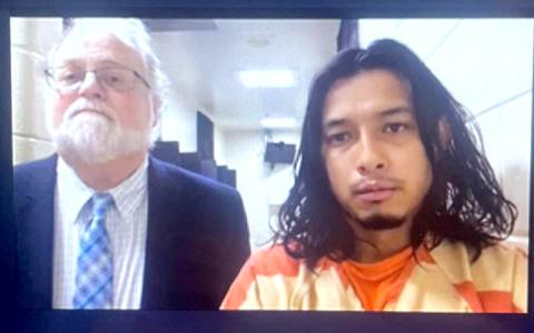 Submitted photo. Angel DeJesus Rivera-Sanchez (right) appears with Public Defender Drew Powell in Habersham County Magistrate Court on Nov. 1 in this video screenshot.