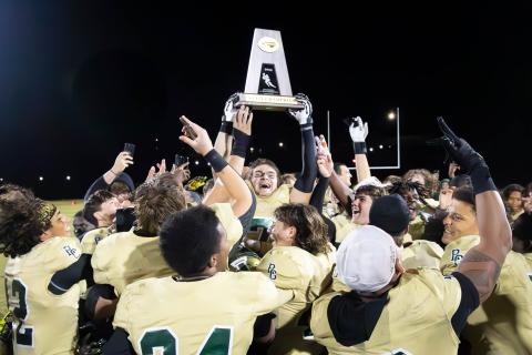 Wade Cheek/The Clayton Tribune. The Rabun Gap-Nacoochee School football team claims its first-ever state title after defeating Providence Day 42-39 in the NCISAA 4A state championship game on Friday, Nov. 15. 